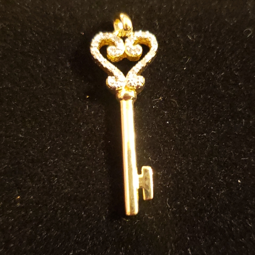 Gold plated "key" charm